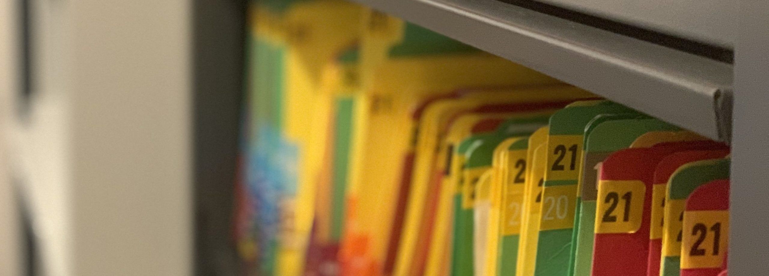 Shelf full of colorful file folders