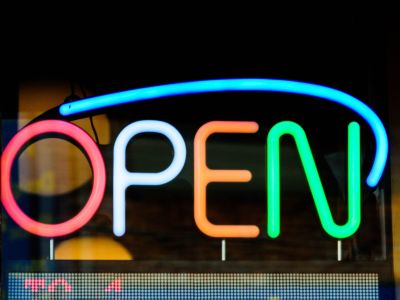 open sign lit up in window