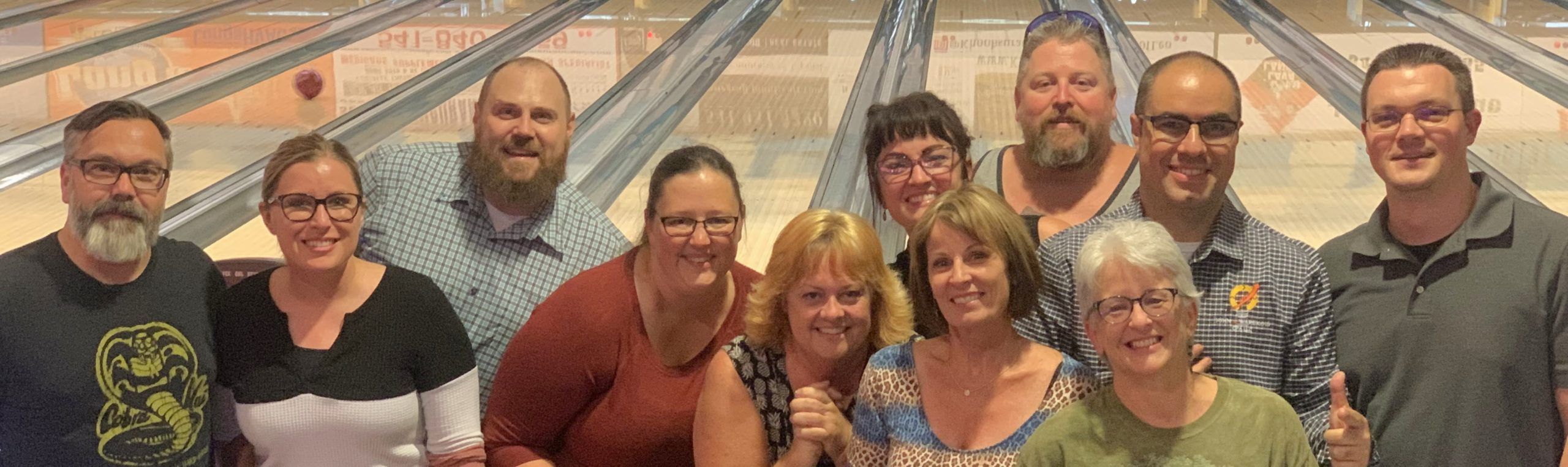 The John Warekois team at a bowling alley