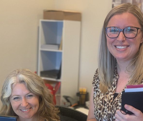 Office workers smiling at the camera