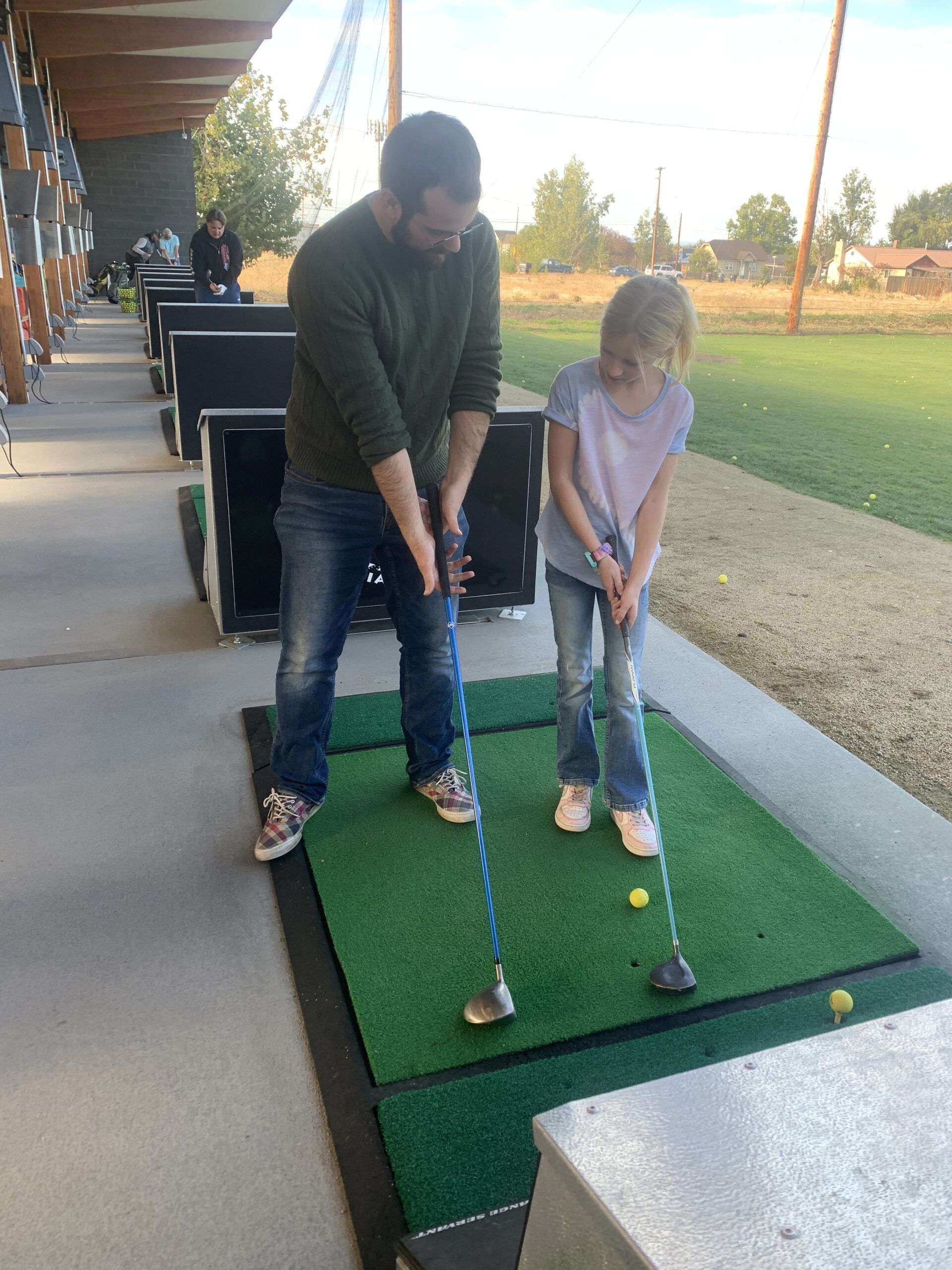 Zach Schoor Teeing off at Top Golf