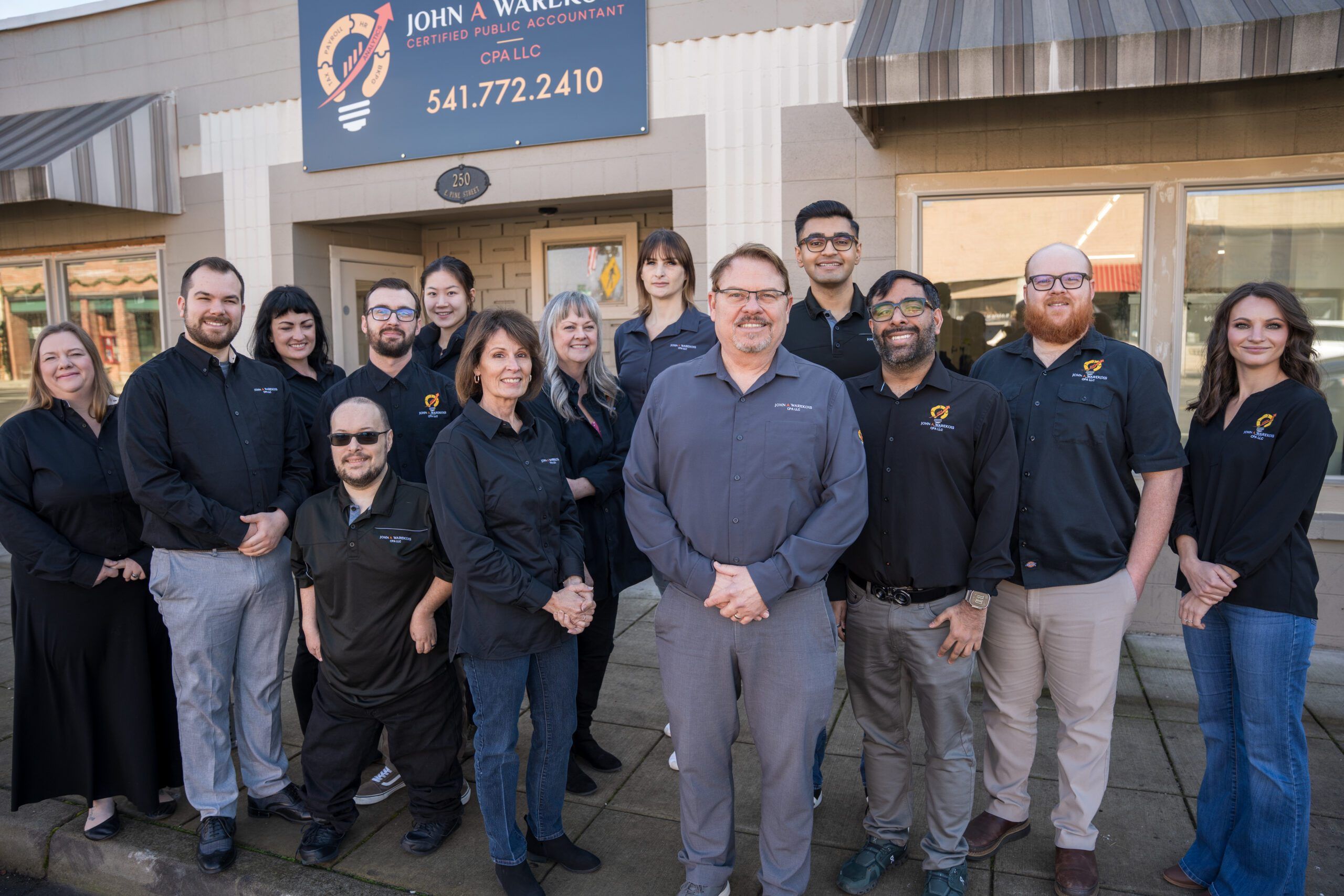 Team photo outside of the Central Point office