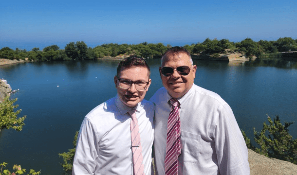 John Warekois and Dylan, his son, in front of a lake