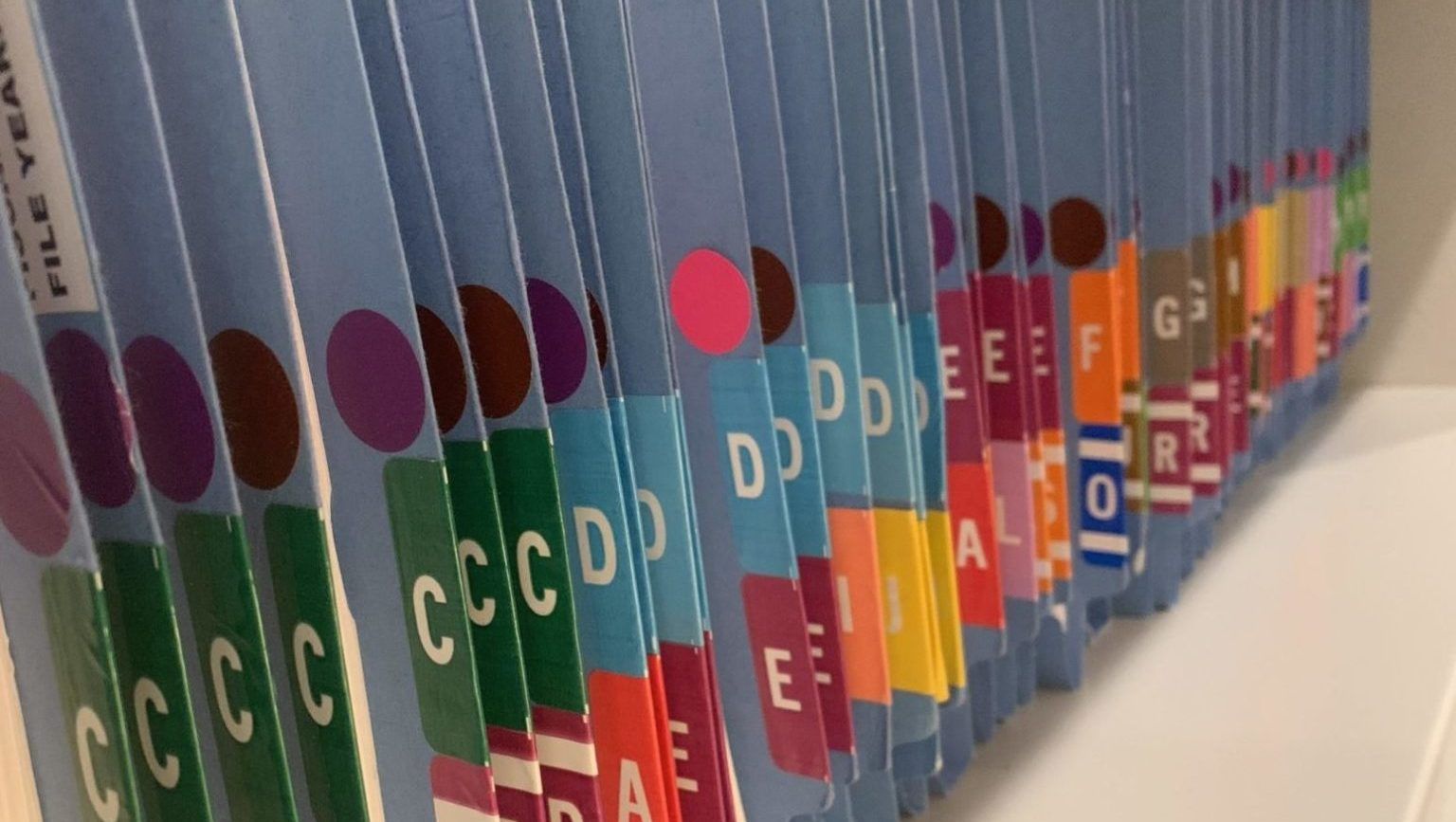 Image of file folders on shelf
