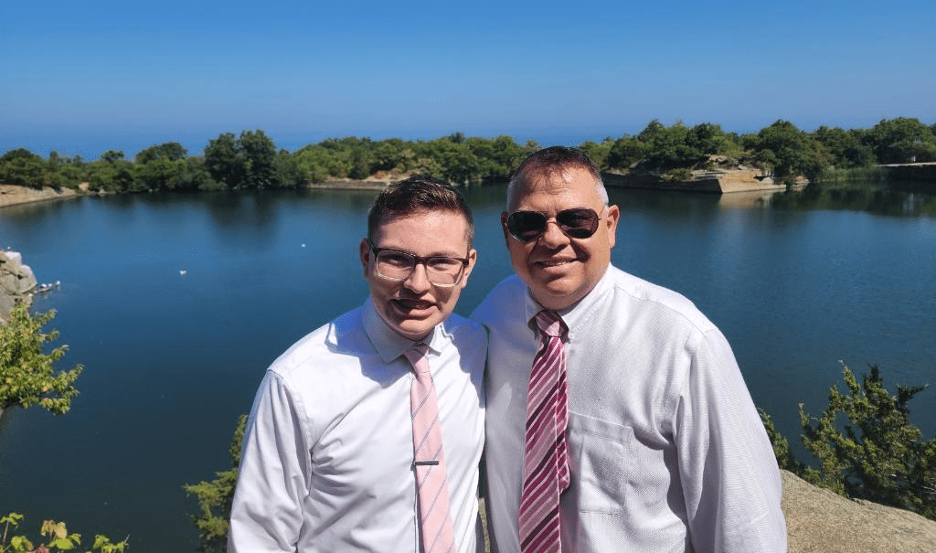 John Warekois and Dylan, his son, in front of a lake
